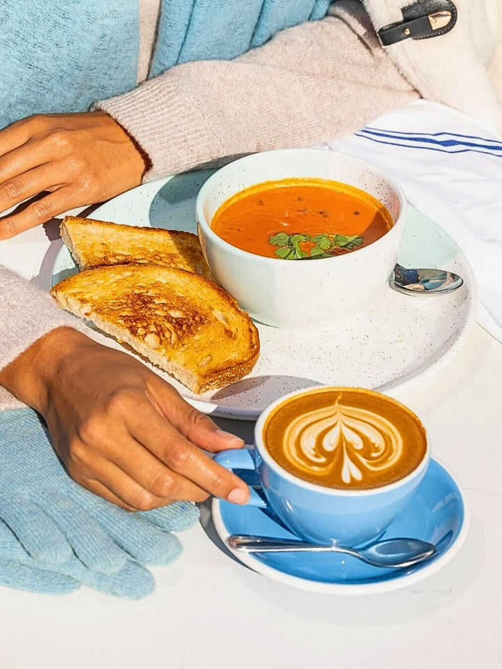 Latte art served in a Classic ACME Latte Large Cup